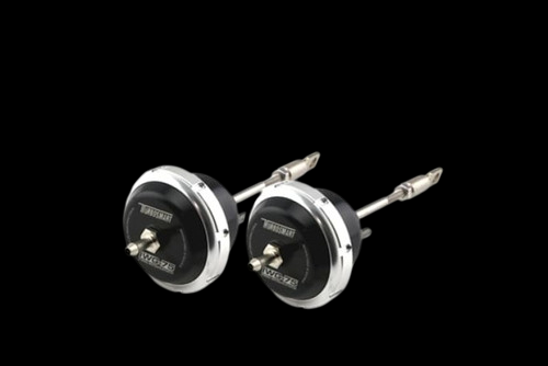 Pair of Turbosmart IWG75 black wastegate actuators, angled view showing rod ends and gauges